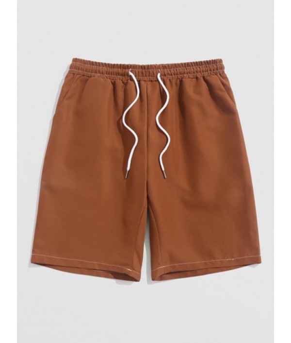 Men's Casual Minimalist Style Japanese Graphic Printed Short Sleeves T-shirt With Solid Color Basic Shorts Set Men's Casual Minimalist Style Japanese Graphic Printed Short Sleeves T-shirt With Solid Color Basic Shorts Set